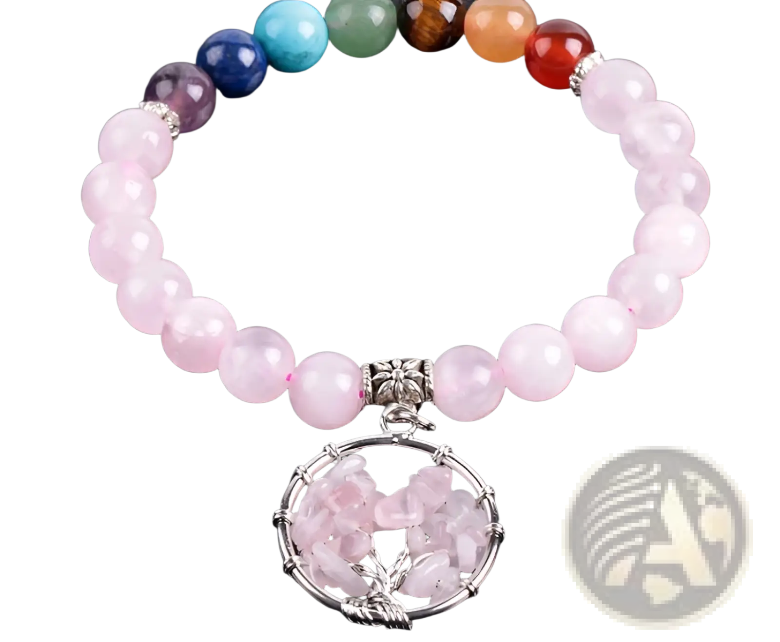 A delicate pink rose quartz beaded bracelet with a silver-toned tree of life charm featuring crystal fragments