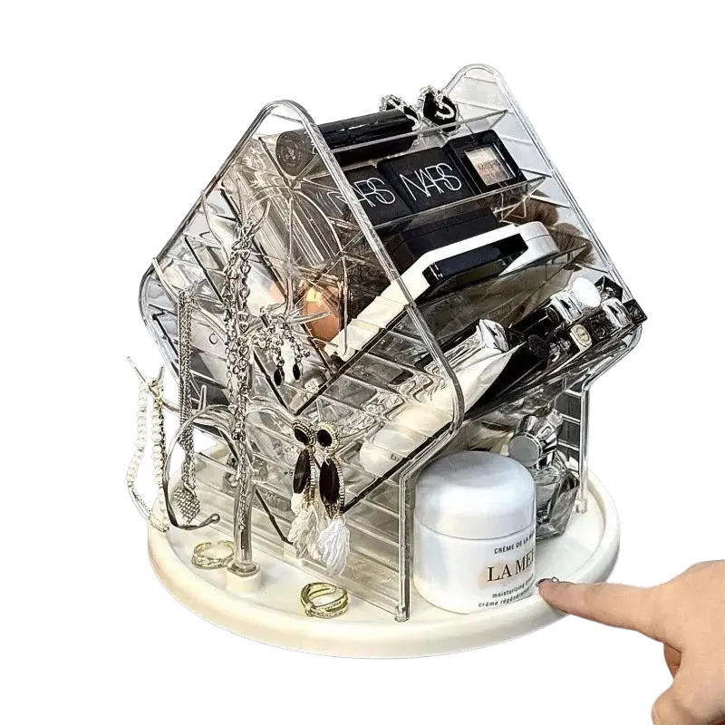 Rotating clear acrylic makeup organizer with multiple compartments and a white circular base for cosmetics storage