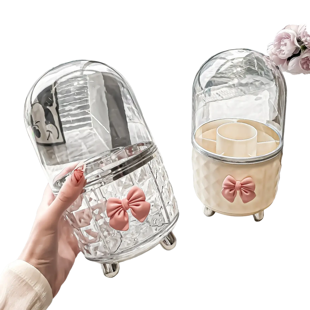 Clear glass dome-shaped rotating cosmetic makeup organizer with pink bow accent and silver metallic feet for storage
