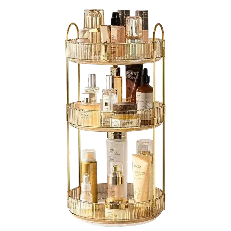 Gold-toned three-tier rotating makeup organizer with ribbed glass shelves and metal rod for large storage