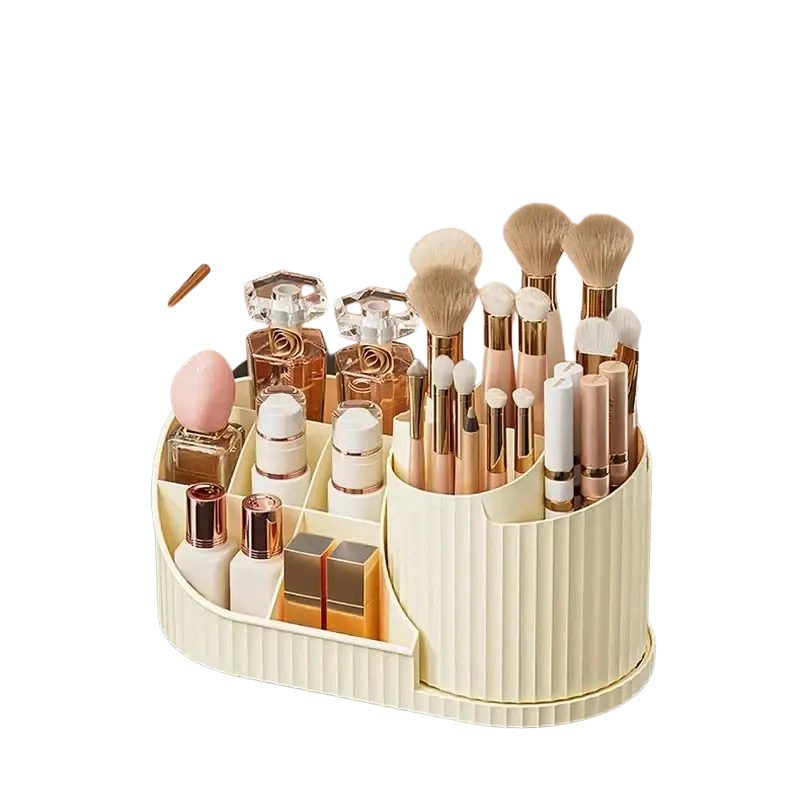 Cream-colored ribbed plastic rotating makeup organizer with multiple compartments holding brushes and cosmetics