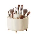 Cream-colored rotating makeup organizer with gold-tone feet 1pc plastic cosmetic storage holding brushes and cosmetics