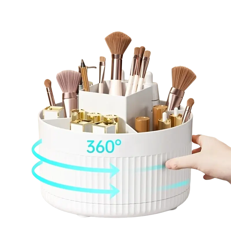 White ribbed plastic rotating makeup organizer with segmented compartments holding brushes and gold-lidded cosmetics