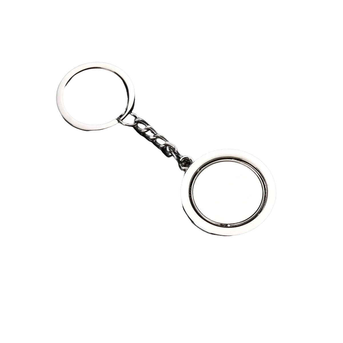 Rotating silver circle keychain with polished metallic ring and flat back surface for custom engraving or decoration