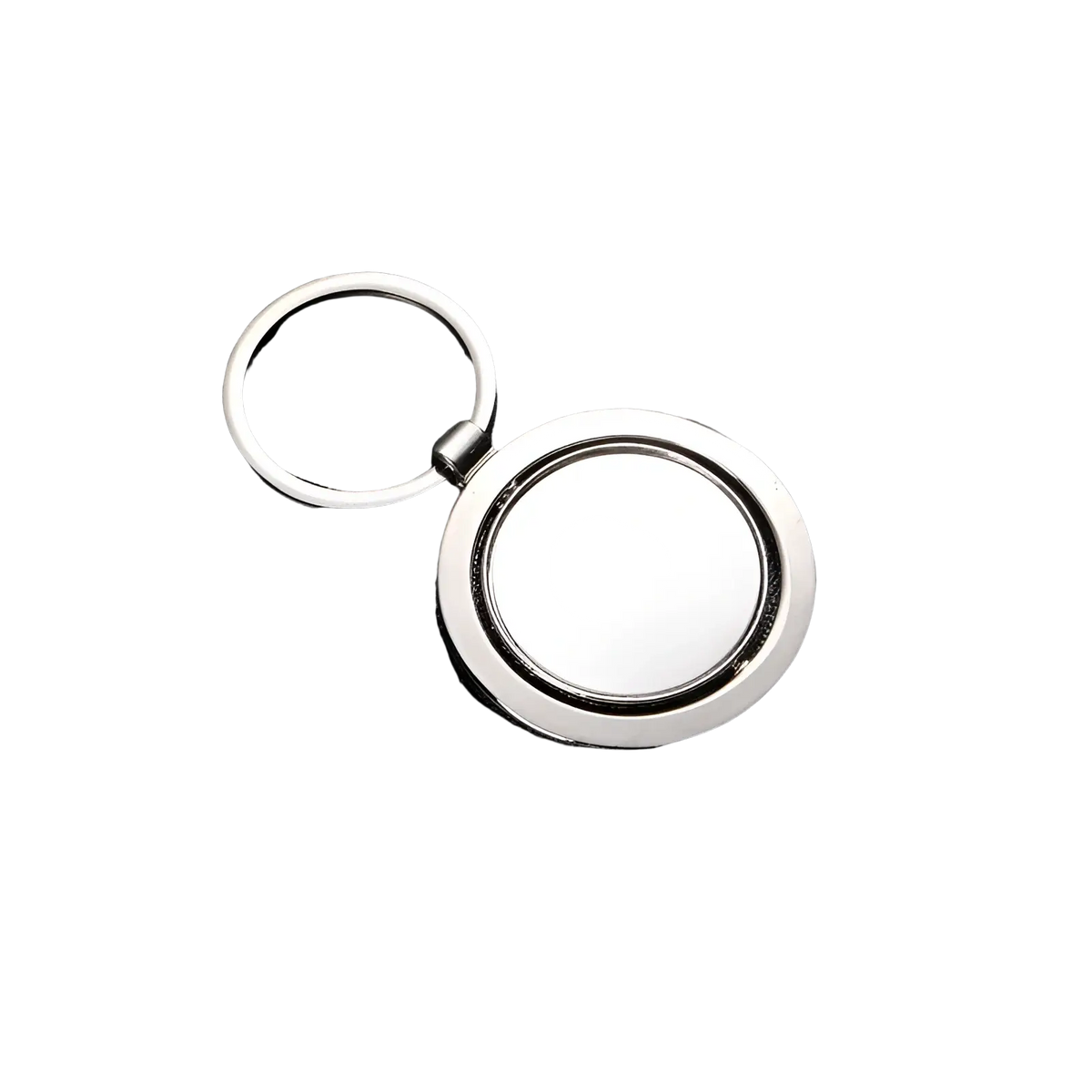 Rotating silver circle keychain with smooth reflective metallic finish and central blank disc for personalized gifts