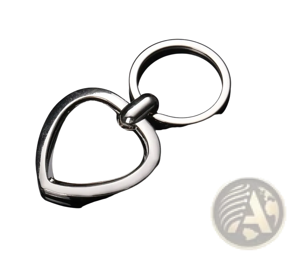 Shiny silver heart-shaped keychain with smooth reflective surface and polished metal ring for rotating silver circle gift