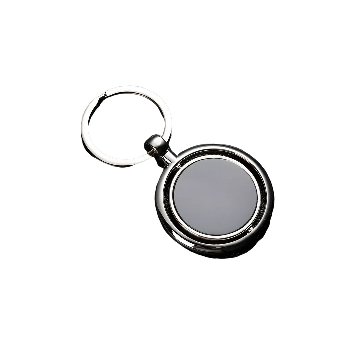 Rotating silver circle keychain with a polished metallic finish and a circular rotating disc design