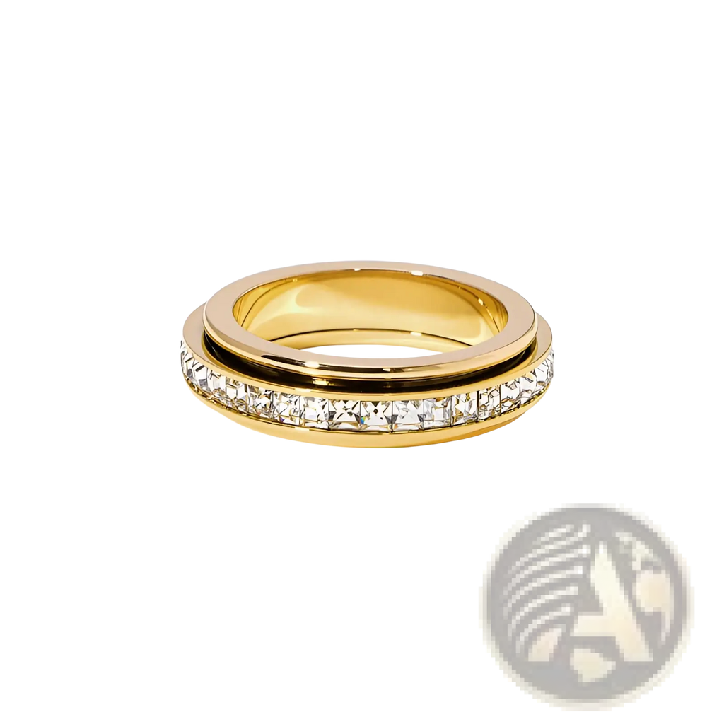 Gold-toned rotating square diamond titanium steel ring with a central band of clear faceted crystals in a sleek design
