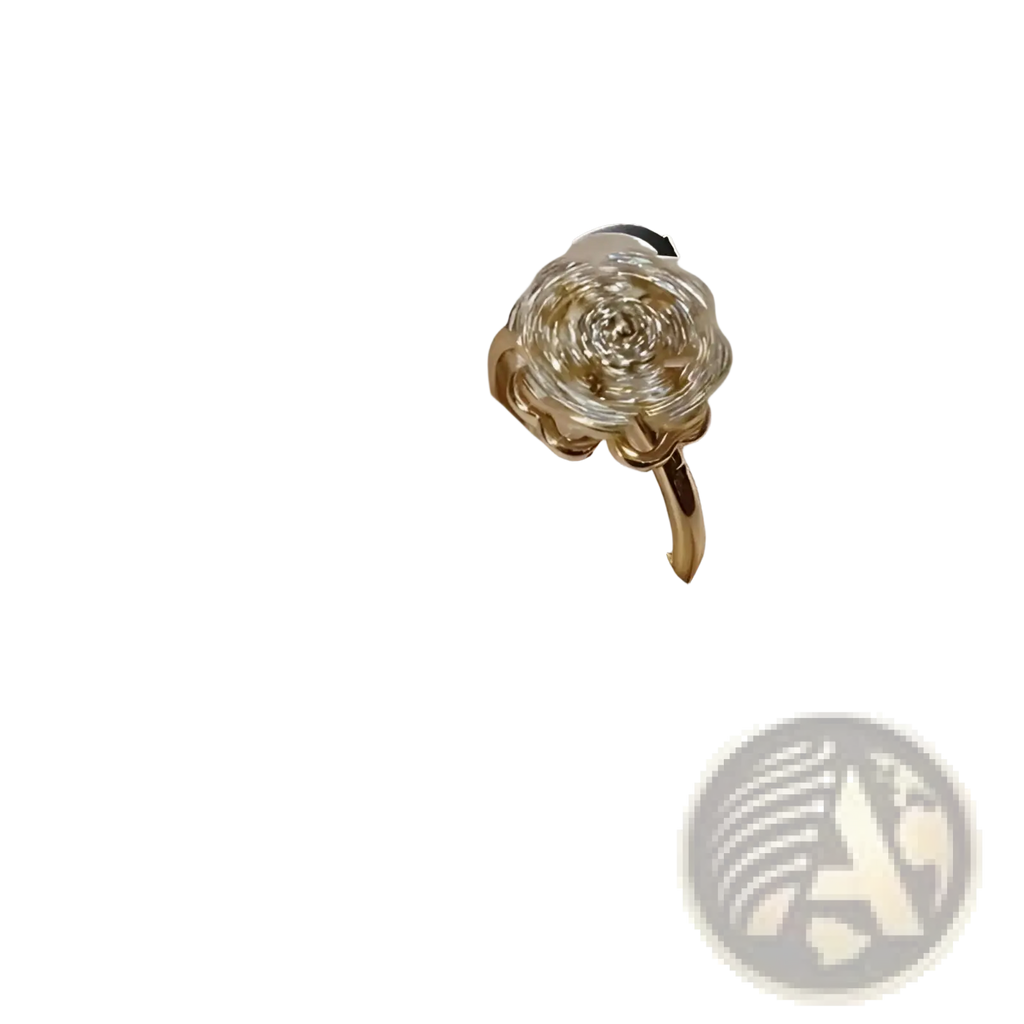 A delicate gold rotating zircon four leaf clover adjustable ring with an intricate multi-layered rose design and clear stones