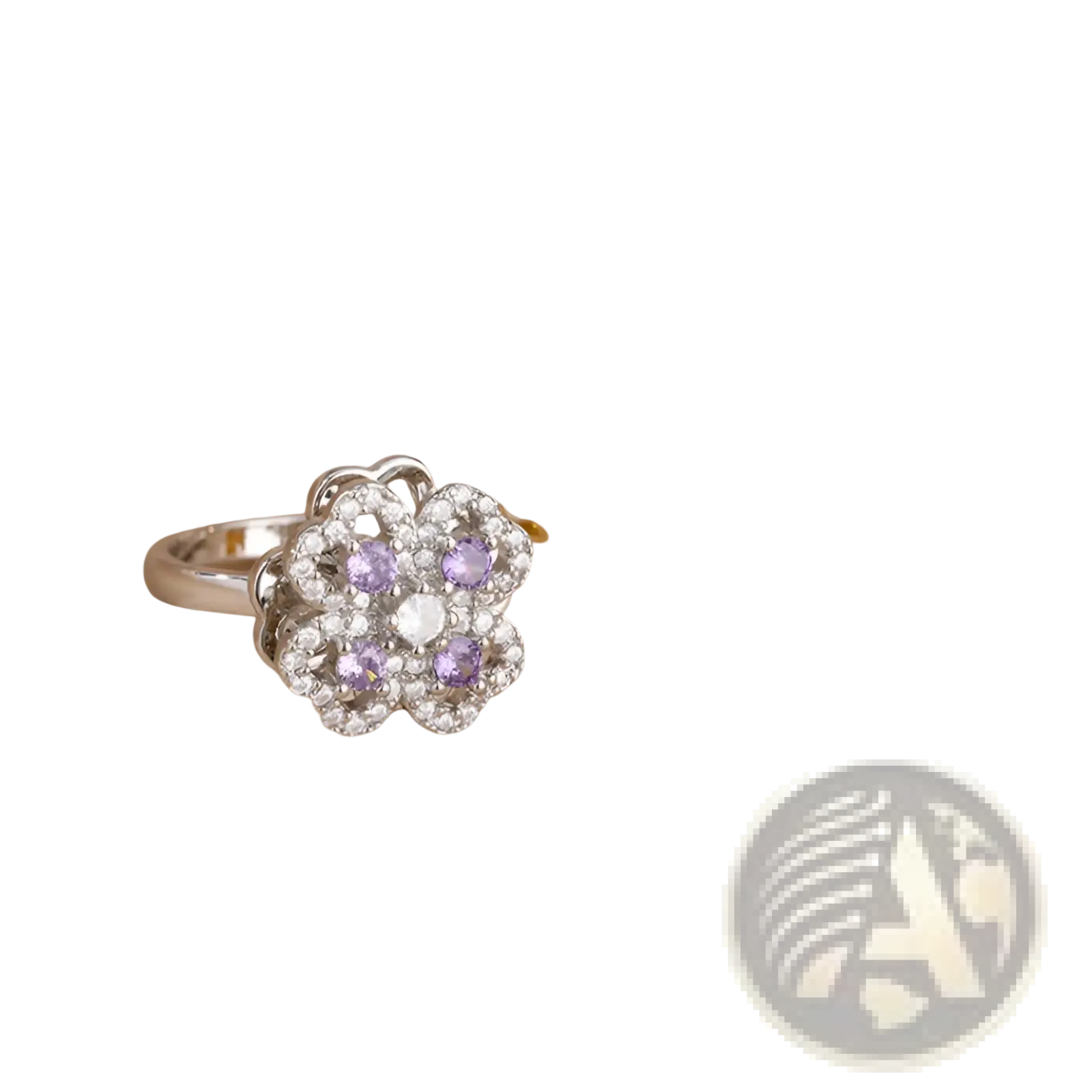 Rotating zircon four leaf clover adjustable silver ring with clear and purple gemstones shaped like a delicate flower
