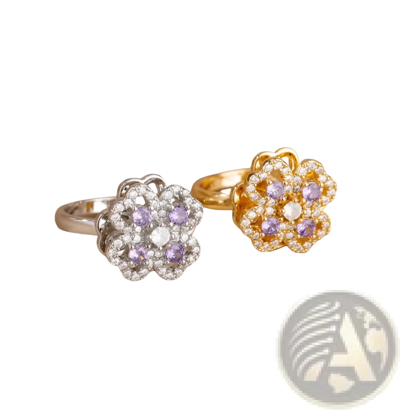 Two rotating zircon four leaf clover adjustable rings in silver and gold with purple gemstones and clear crystals
