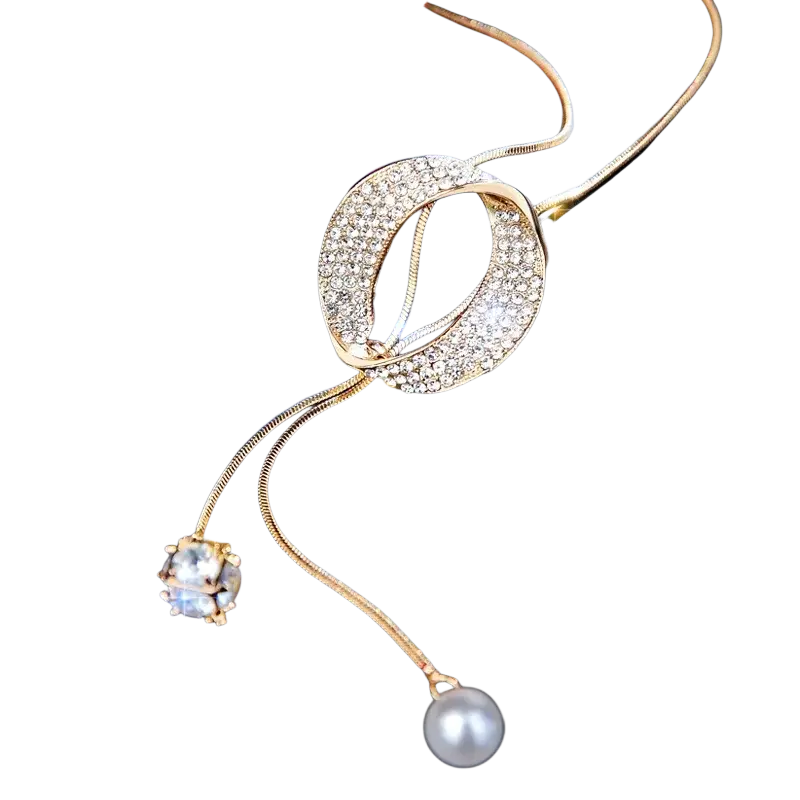 Gold-toned circle pendant necklace featuring round circle pendant with diamond accents, clear crystal, and white pearl charms