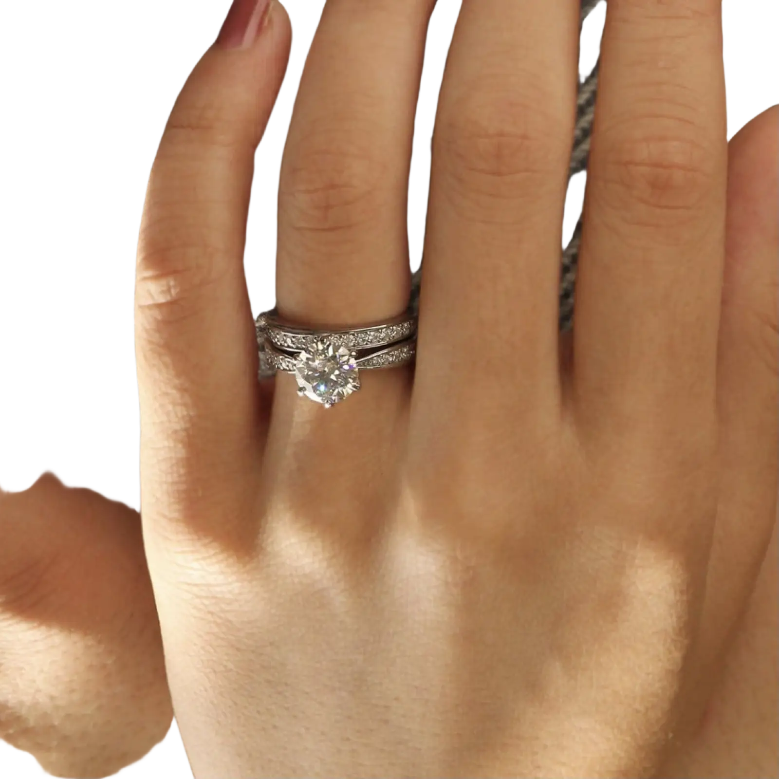Round cut zircon wedding ring set in white gold finish with a silver-toned engagement ring featuring a diamond center stone