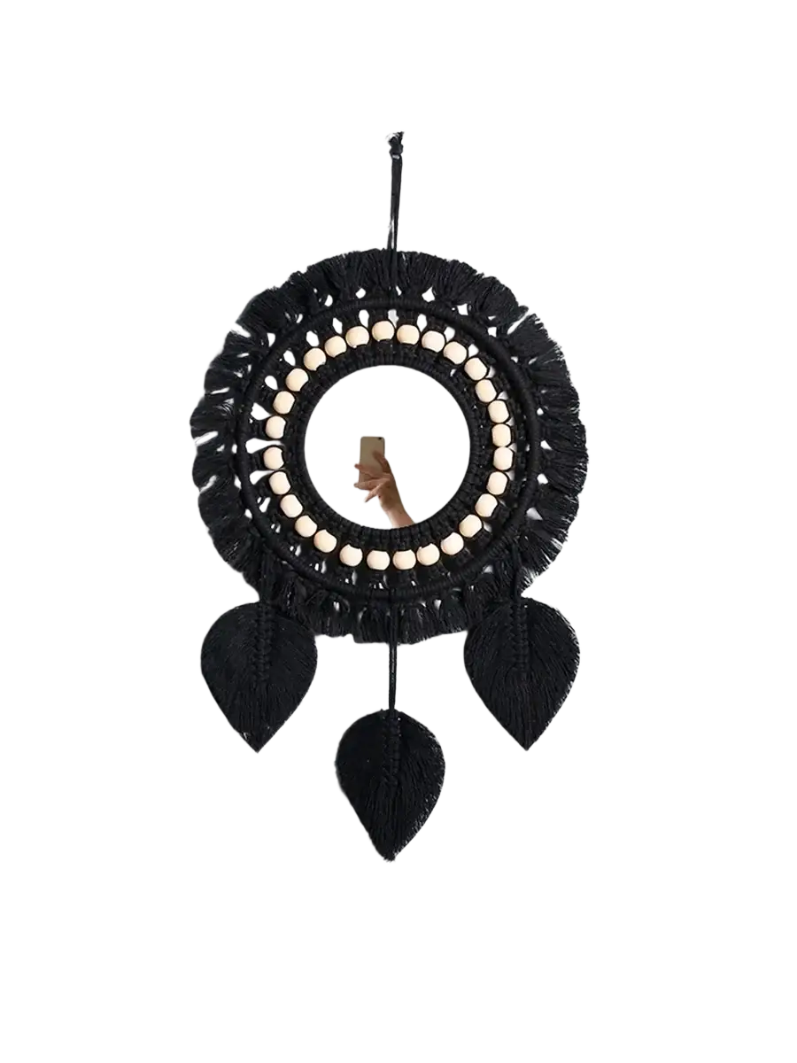 Black round macrame wall mirror with beaded border and hanging leaf accents decorative mirrors for boho decor