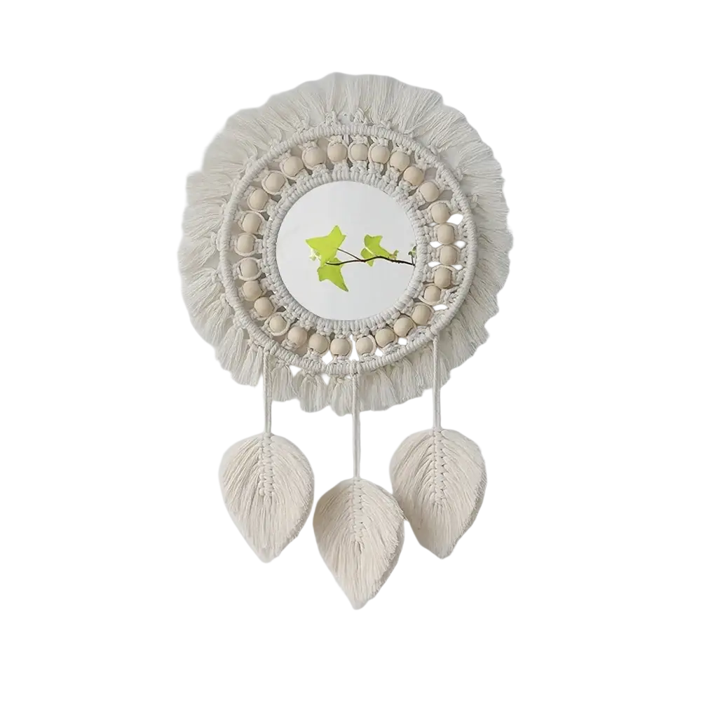 Cream-colored round macrame wall mirror with wooden beads tassels and leaf-shaped hanging ornaments decorative mirrors