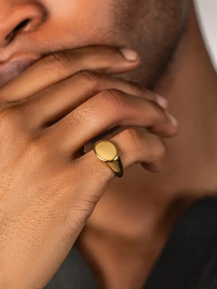 18k gold polished oval signet ring in stainless steel with smooth oval face and sleek band
