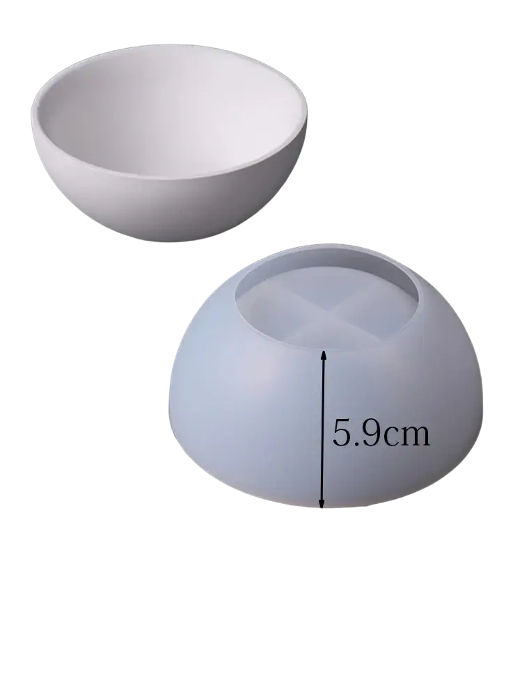 White silicone round mold with smooth exterior and cross-shaped dividers for concrete bowls and candles