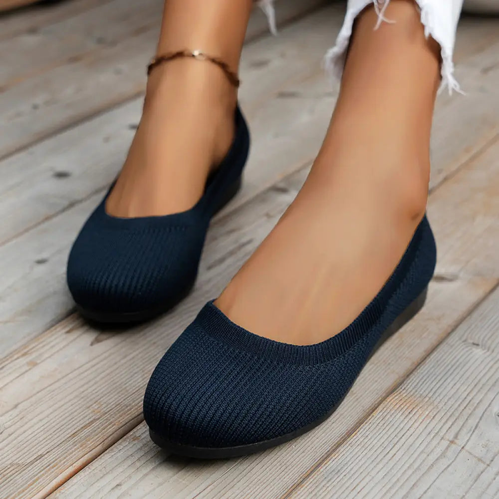 Navy blue women’s round toe knit mesh slip on flats with soft ribbed texture and low profile sole