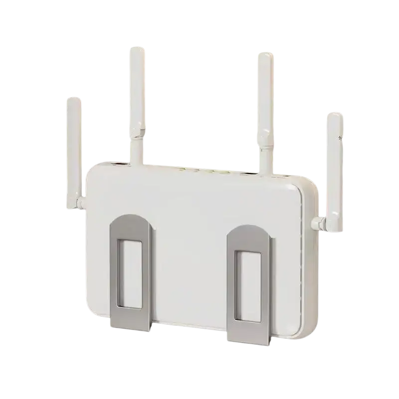 White wireless router with four antennas mounted on a gray box wall storage designed for heat dissipation and wall-mounted design