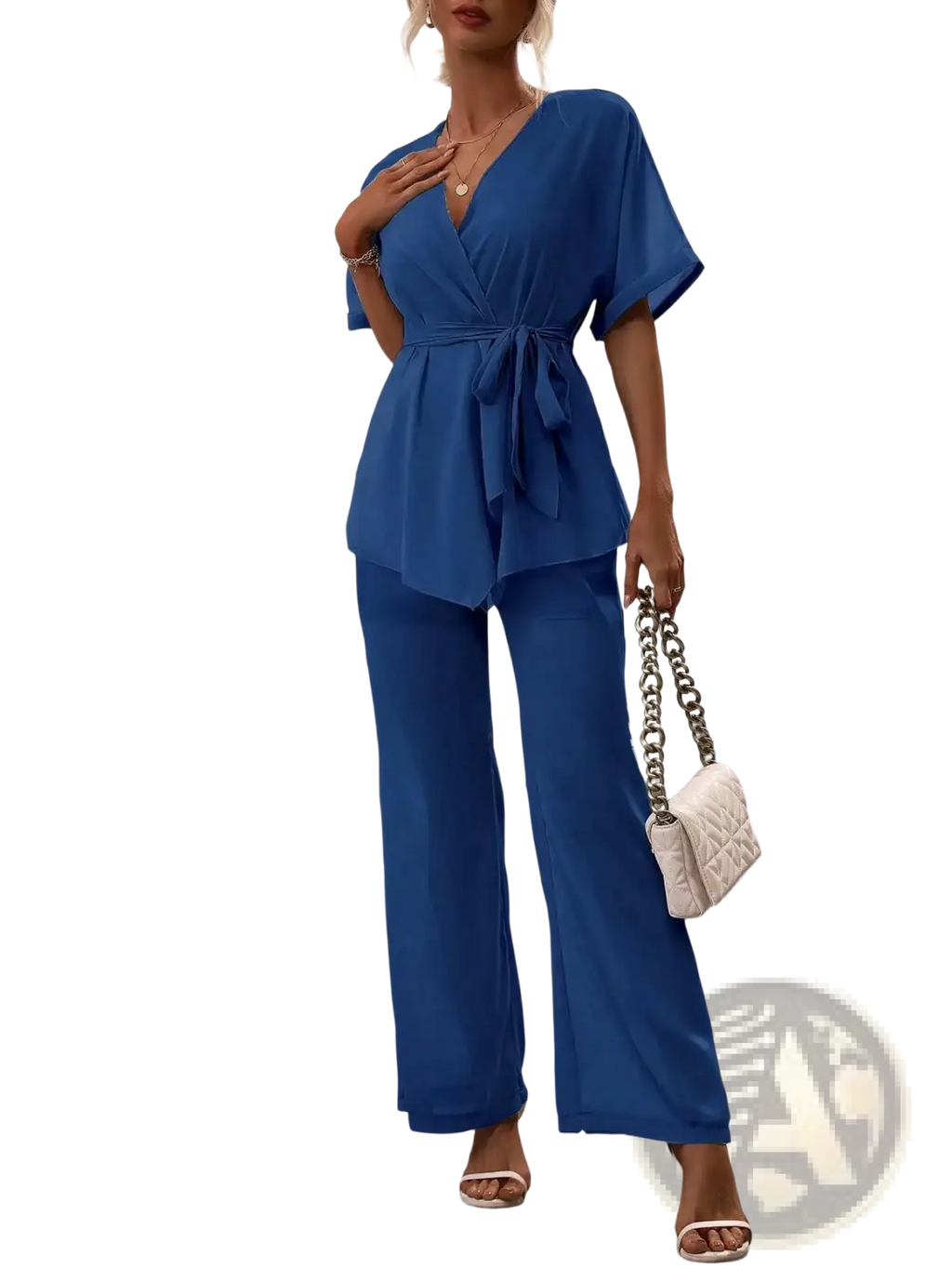 Royal blue satin two piece outfit featuring a v neck satin jumpsuit with a matching belt tied at the waist