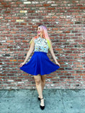 Vibrant royal blue retro a-line skater skirt with pockets made from soft flared fabric for stylish casual wear