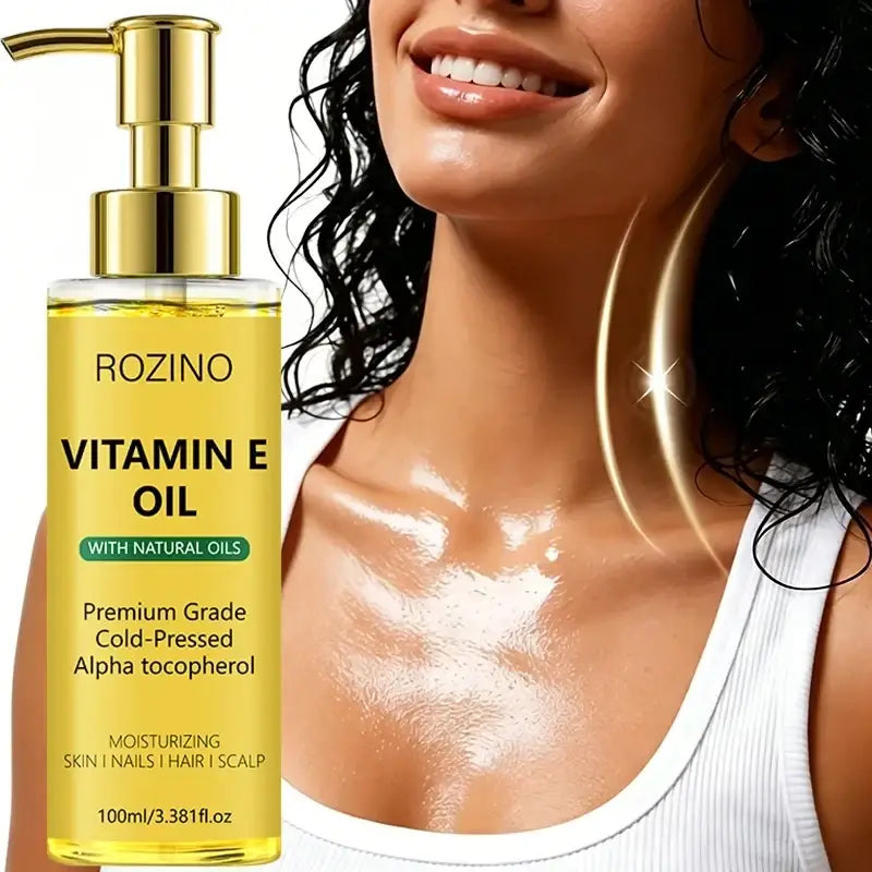 Gold pump bottle of Rozino vitamin e care oil with yellow label and clear glass body to soften dry skin