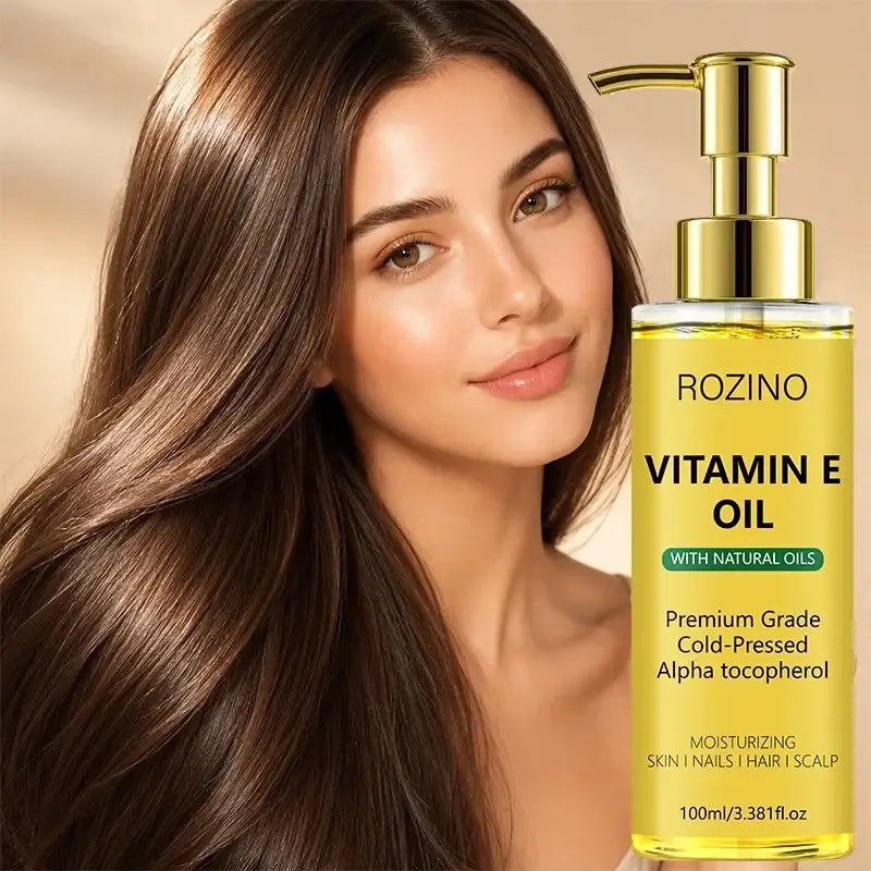 Gold pump bottle of rozino vitamin e care oil with yellow liquid to soften dry skin and nourish effectively