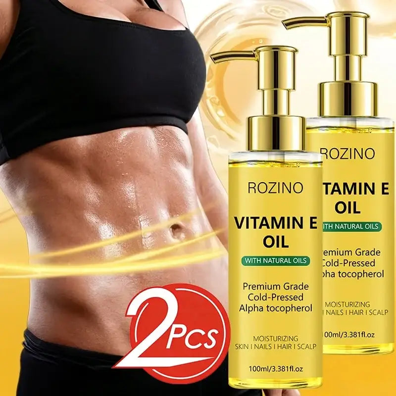 Gold pump bottles of rozino vitamin e care oil with transparent glass bodies to soften dry skin nails hair and scalp