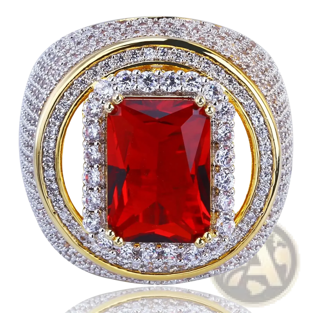 A ruby cz gold filled statement ring with a rectangular red gemstone and two bands of clear crystals