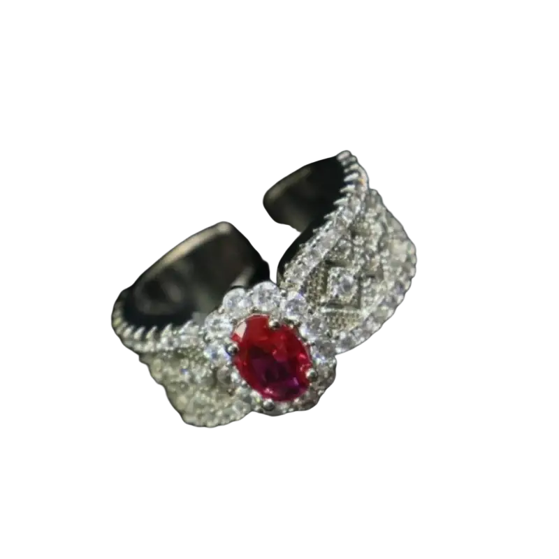 Silver-toned adjustable ruby halo ring with oval red ruby and diamond pavé band featuring intricate detailing