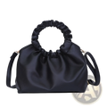 Black leather ruched leather bucket bag with adjustable shoulder strap and ruched top handle for versatile use