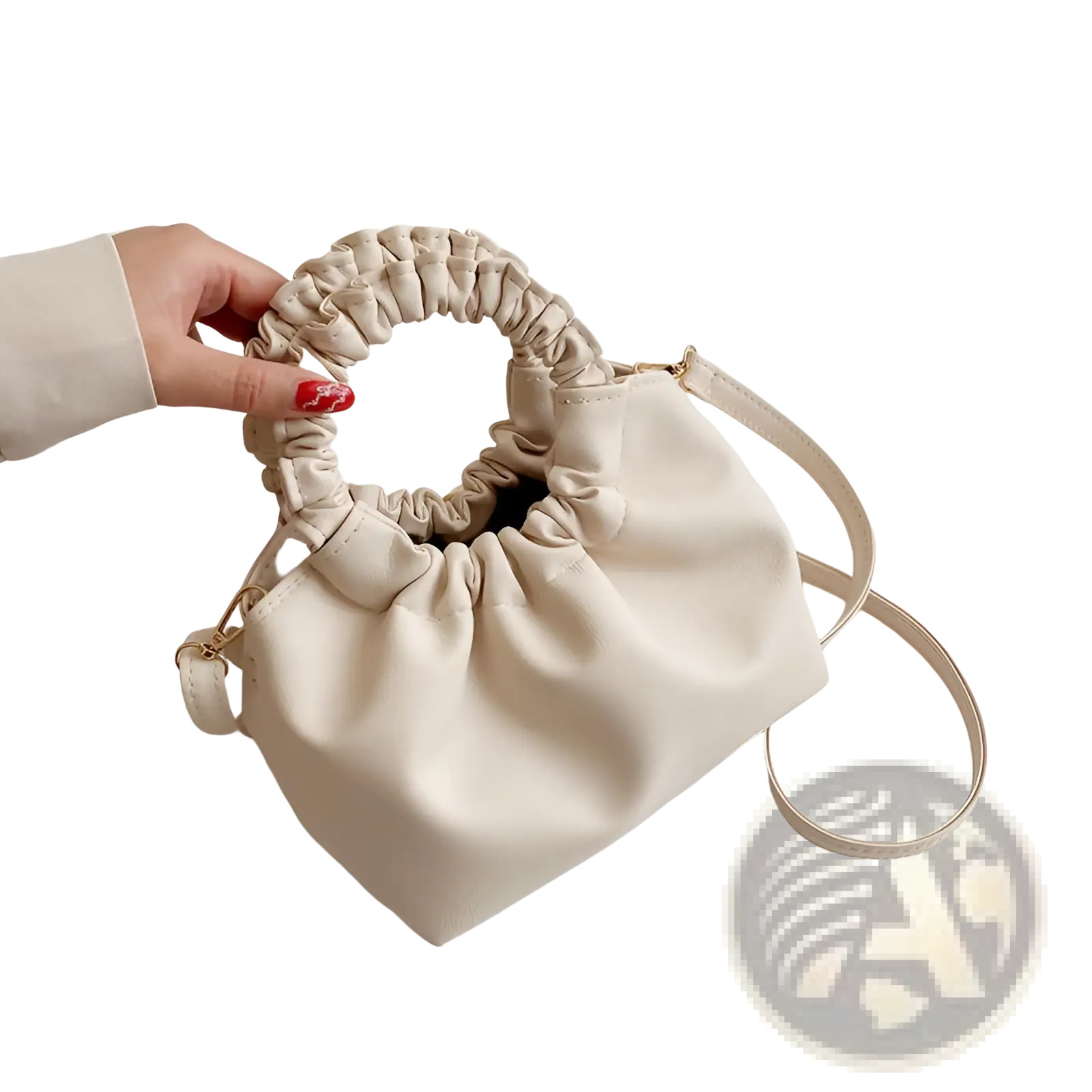 Cream-colored ruched leather bucket bag with gathered top handle and adjustable shoulder strap