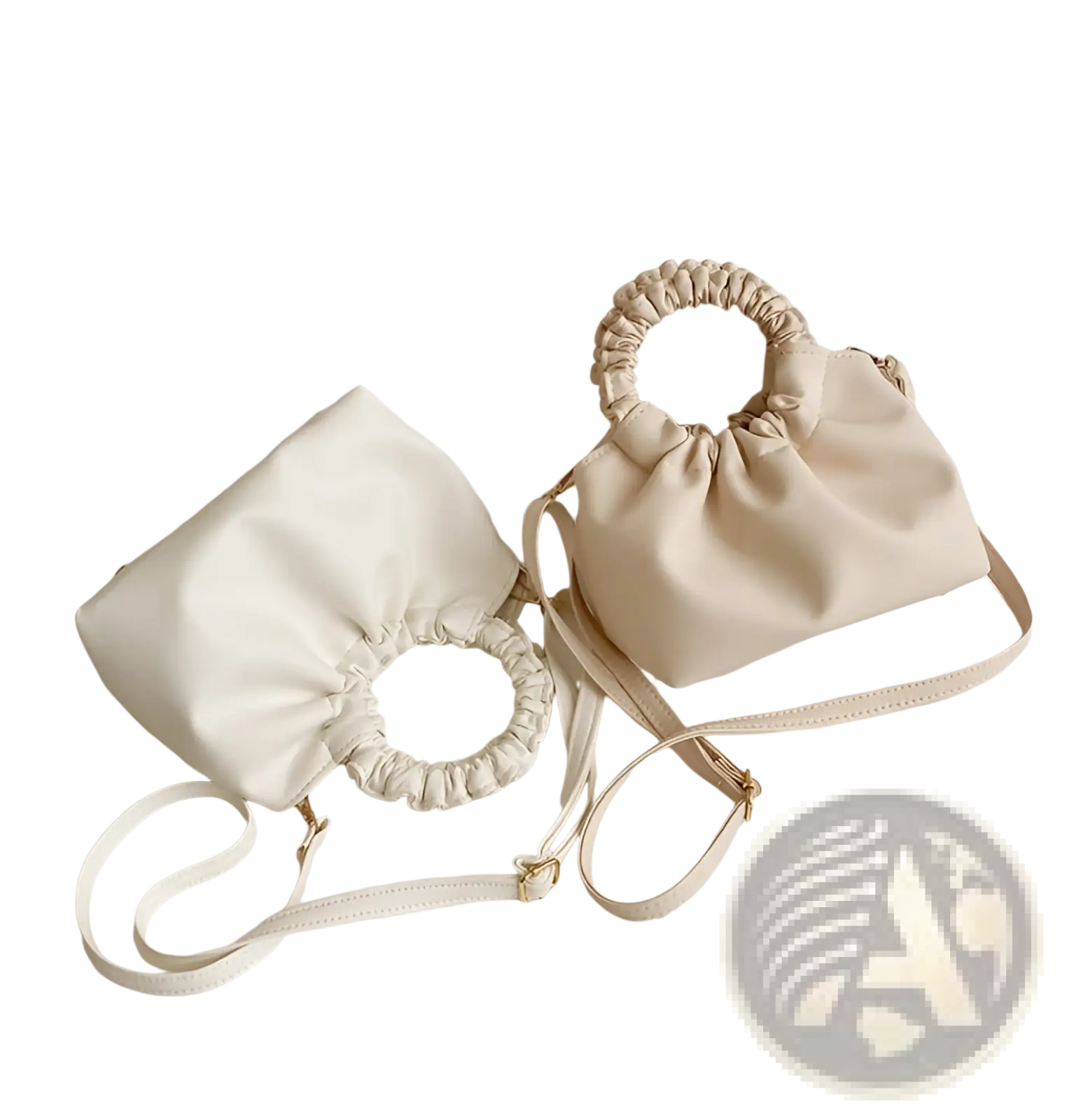 Cream-colored faux leather ruched leather bucket bag with gathered top handle and adjustable shoulder strap
