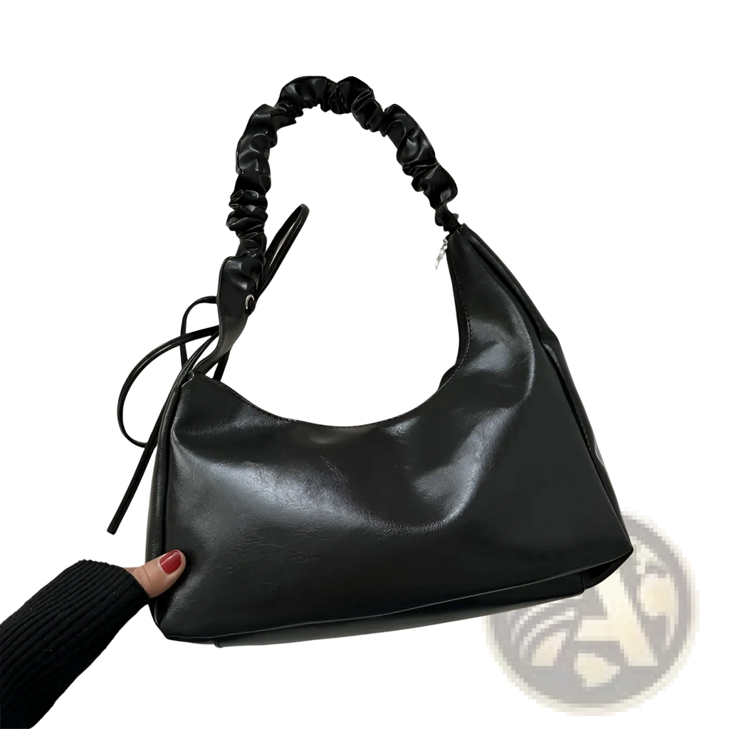 Black faux leather ruched shoulder bag with elasticated top handle and adjustable drawstring detail