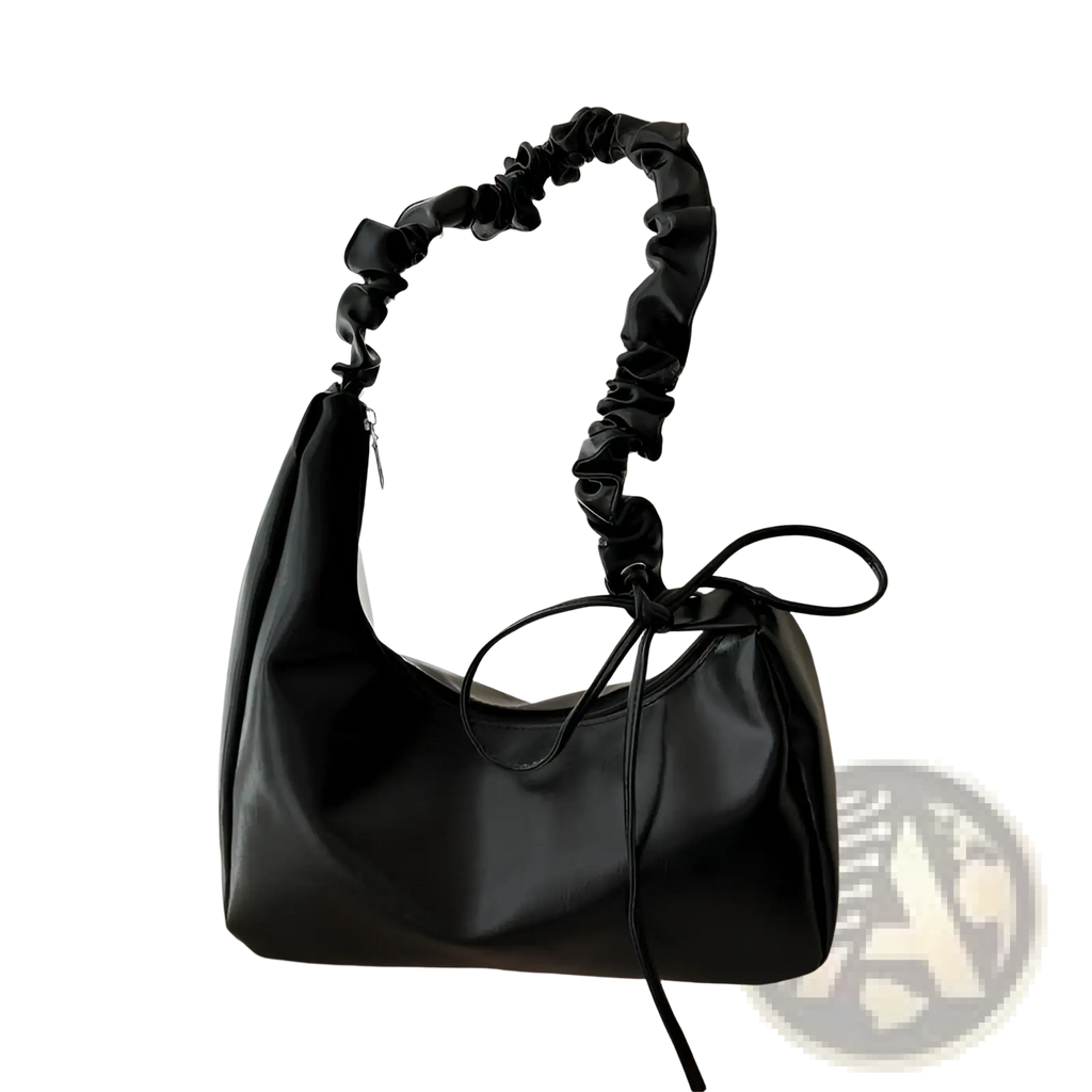 Black faux leather ruched shoulder bag with elasticated handle and tied bow detail patent leather handbag