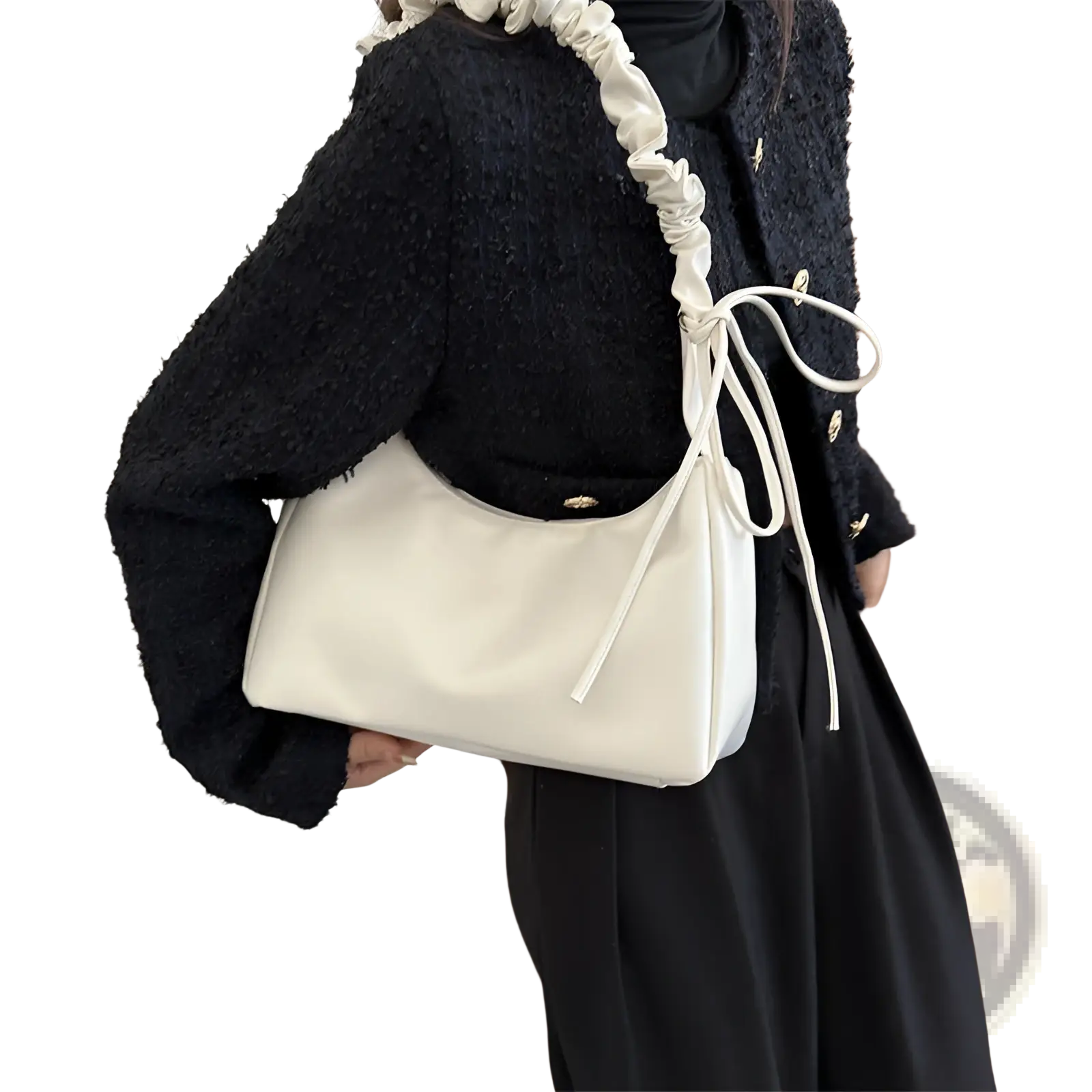 Cream-colored faux leather ruched shoulder bag with tied strap featured in ruched shoulder bag patent leather handbag