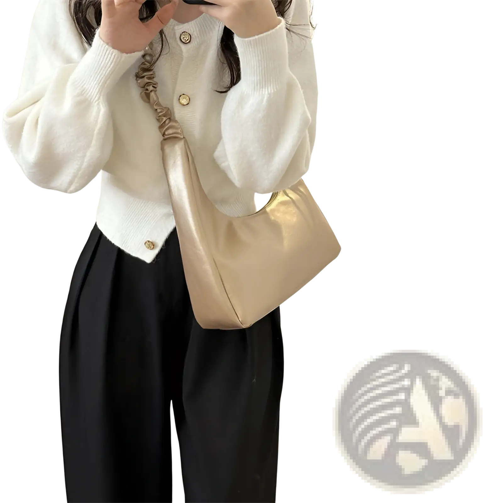 A sleek metallic gold ruched shoulder bag made of patent leather with a glossy finish and ruched strap