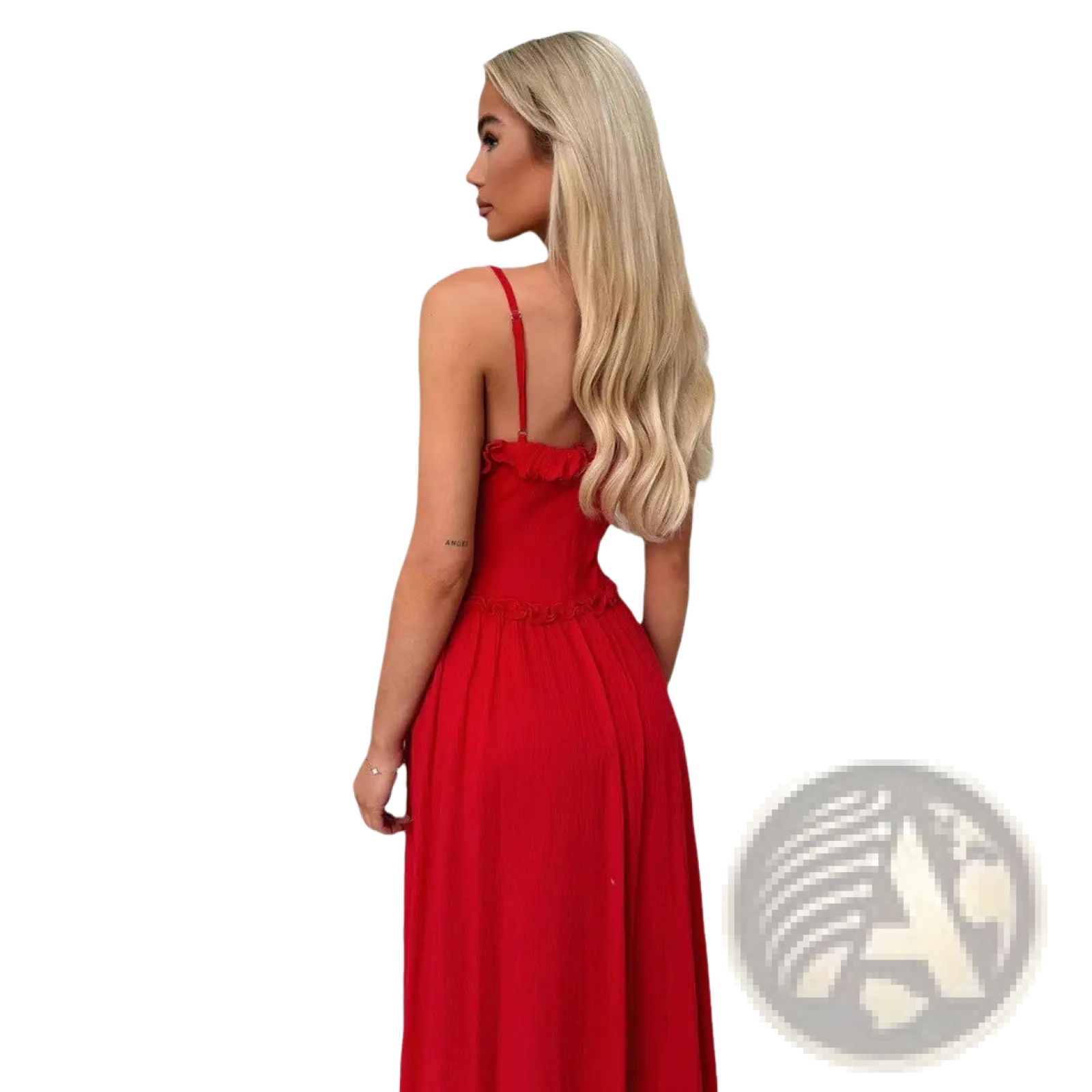A vibrant red sleeveless flowing maxi vacation dress with thin straps and a ruffled neckline