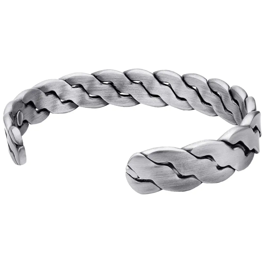 Silver-toned rugged braided copper magnetic therapy cuff bracelet with textured woven metal design