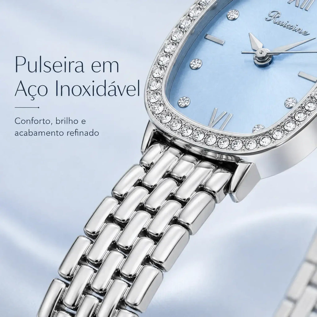 Ruixine silver crystal mesh women watch with a sleek silver stainless steel case and light blue dial with roman numerals