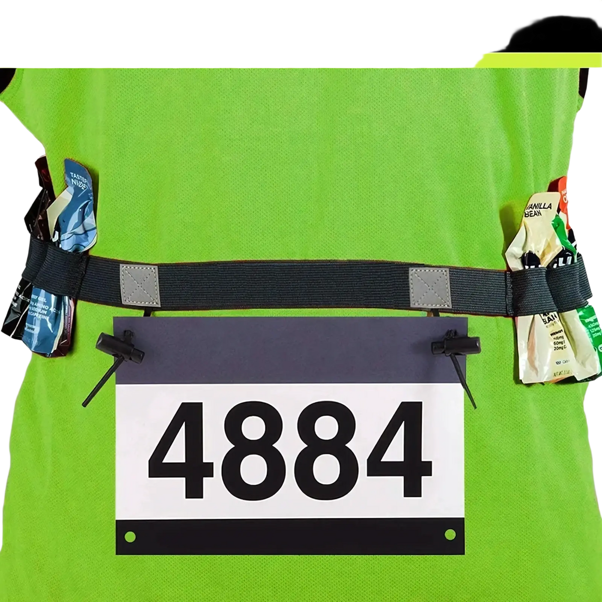 Running race bib belt in green with black elastic straps and reflective patches holding energy gel loops on sides