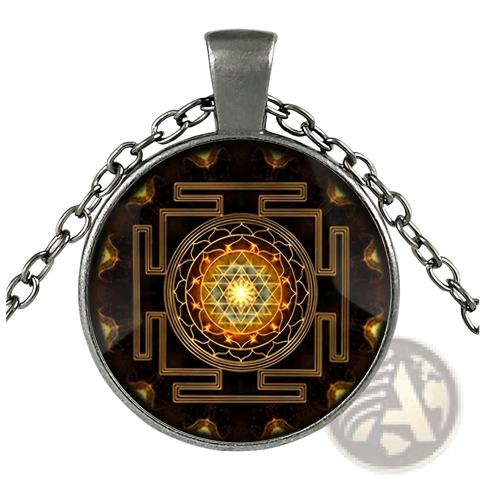 Silver-toned pendant necklace with a circular glass cabochon featuring a golden sri yantra design on dark background