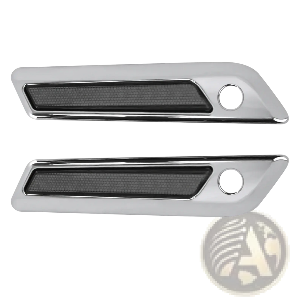 Chrome-finished saddlebag latch covers for harley touring 2014 up with black textured inserts and circular mounting holes