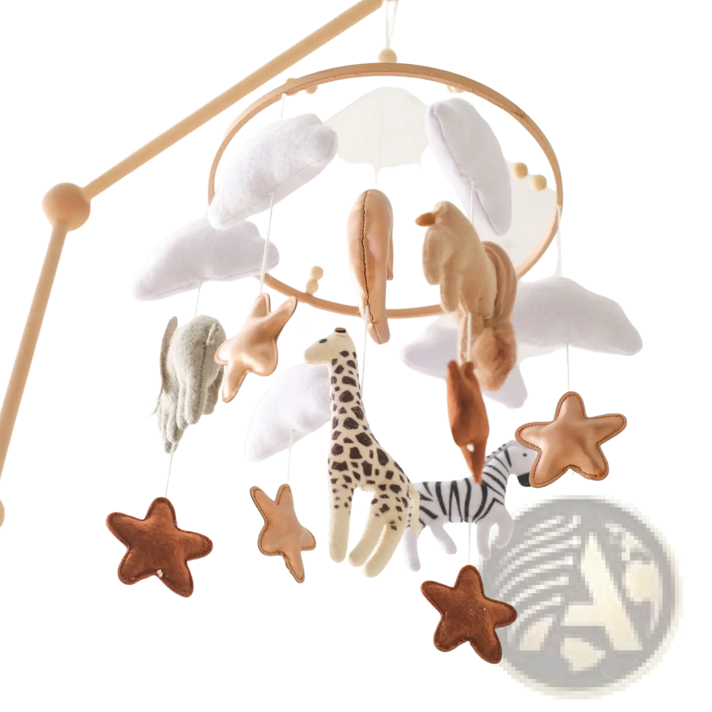 A soft felt safari animal wooden crib mobile with embroidered animals stars and felt clouds hanging from a wooden hoop