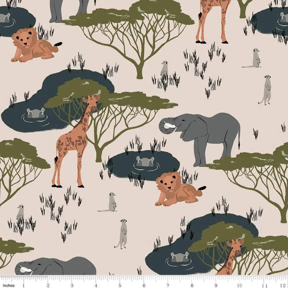 Safari animal print bow neck cotton blouse in soft beige with illustrated giraffes elephants lions and meerkats pattern