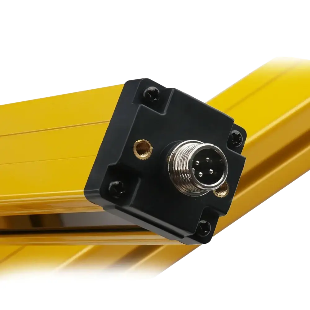 Black rectangular safety light curtain dual relay sensor housing with metallic 5-pin connector and gold threaded ports mounted on yellow rail