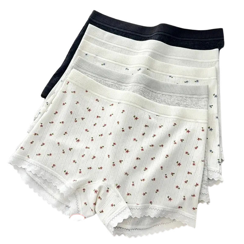 White floral-patterned cotton safety short pants with ribbed waistband and scalloped hem for comfortable wear