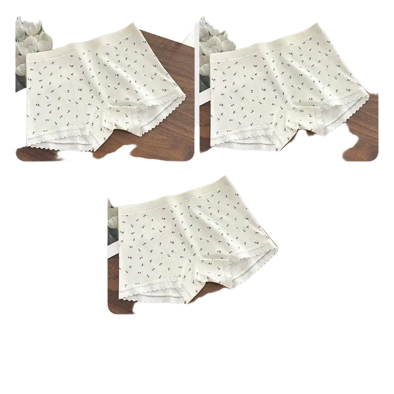 White cotton lace safety short pants with delicate blue floral patterns and scalloped edges in boyshort style