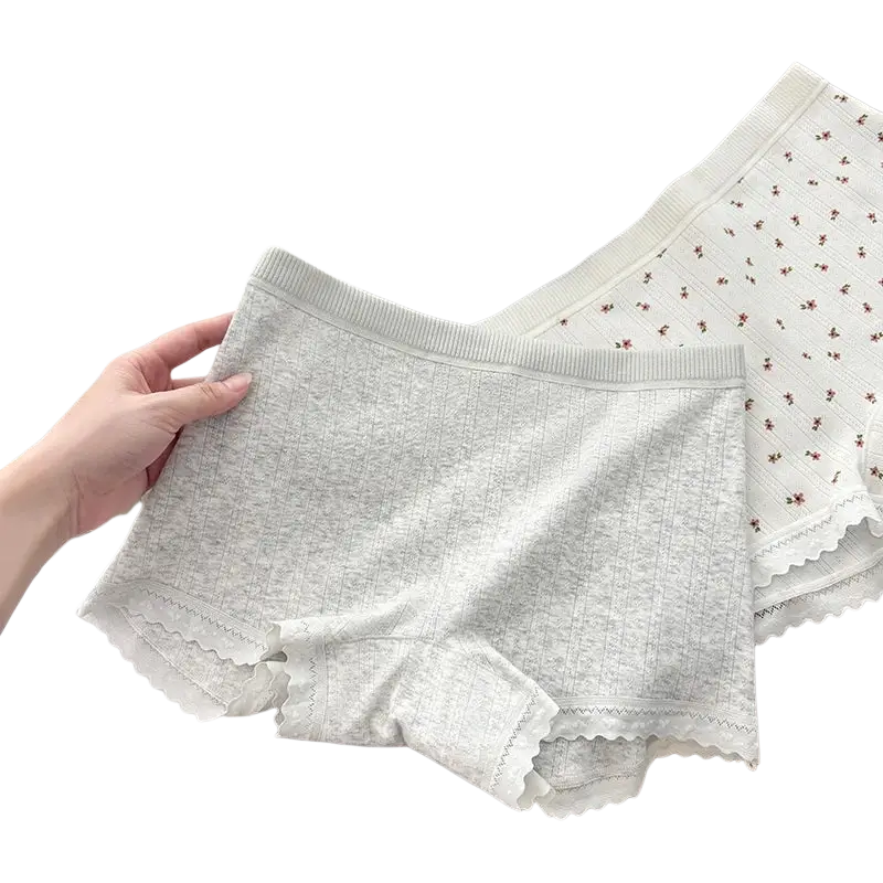 Safety short pants in soft heather gray cotton with delicate scalloped hem and subtle vertical ribbing for comfort