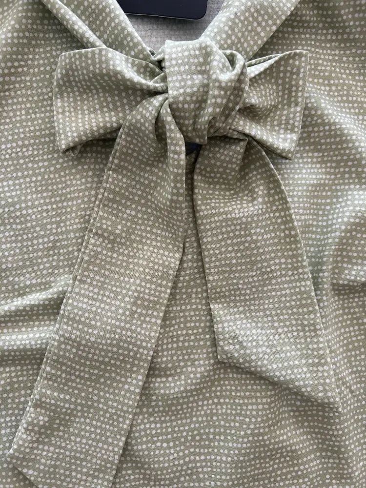 Sage dot bow neck vintage cotton blouse in sage green with white polka dots and a tied neckline bow